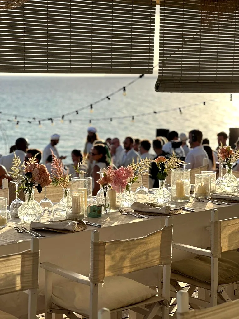 Sunset long table wedding reception on Playa Migjorn